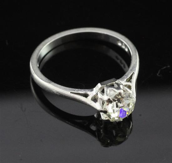 A platinum and solitaire diamond ring, size L.